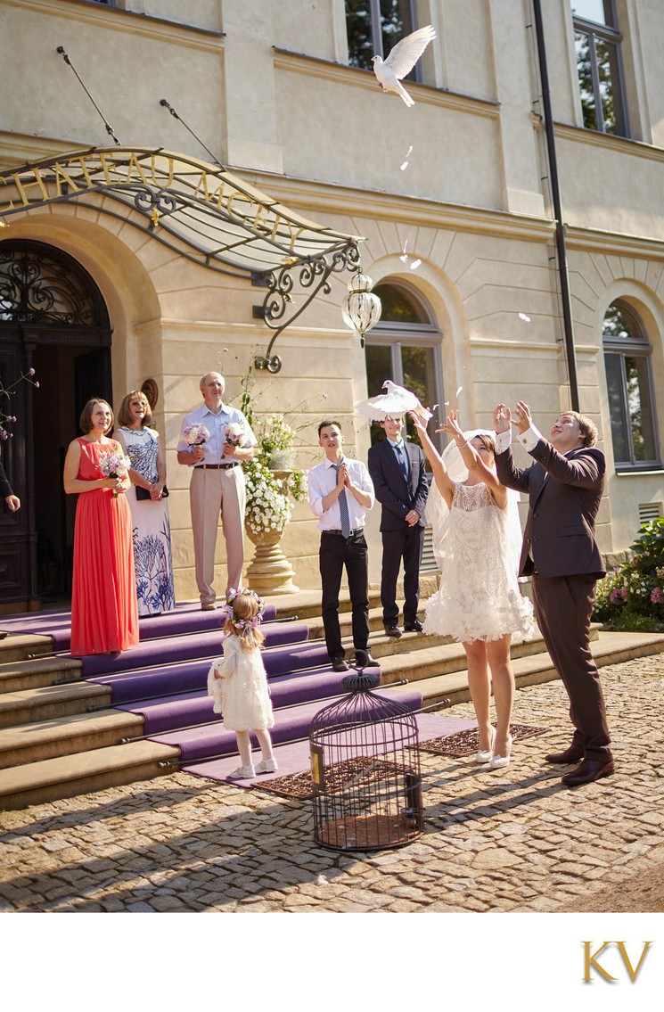 bride & groom releasing the doves Chateau Mcely wedding