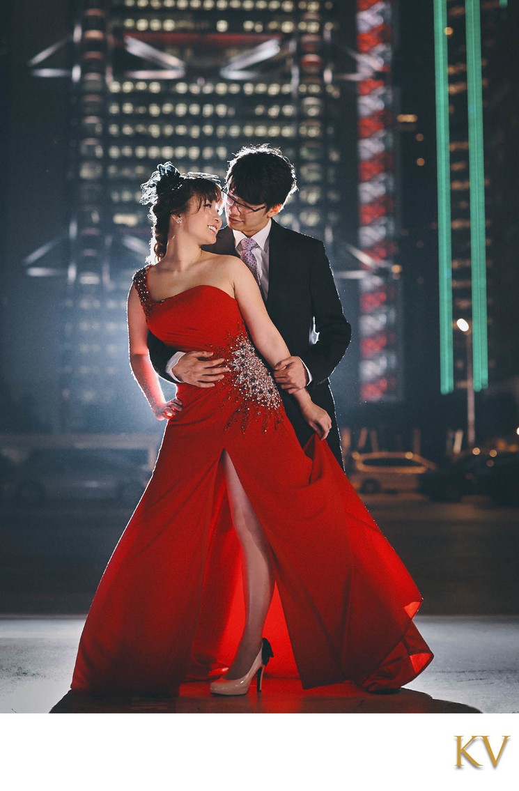 Sexy Hong Kong couple posing at night in Central