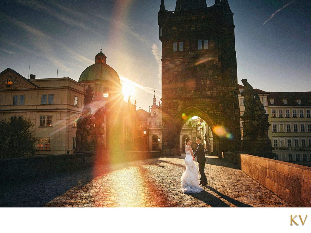 sun flared lovers at Charles Bridge