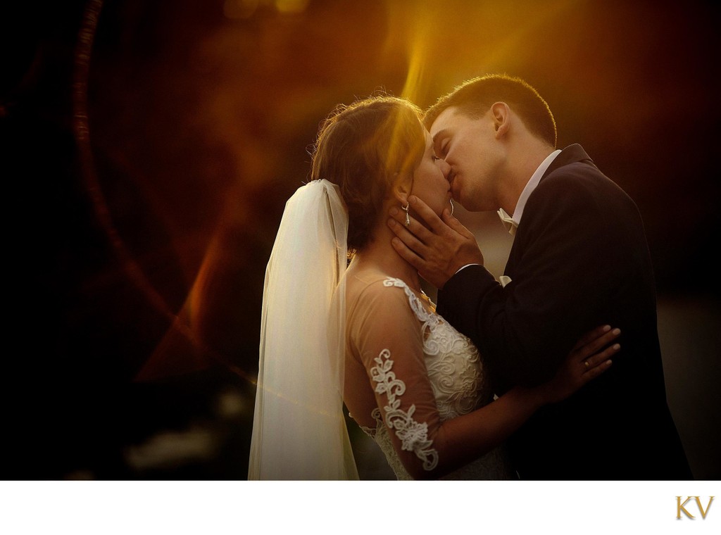 sun-flared kiss - Prague Weddings