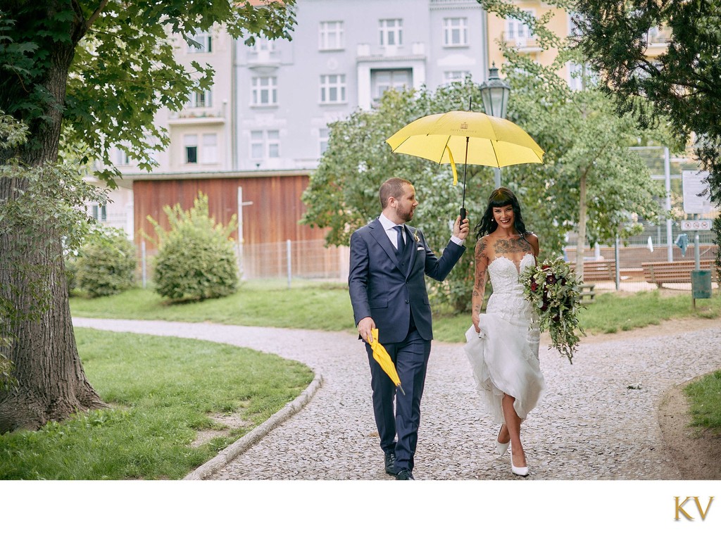 Newlyweds in the rain