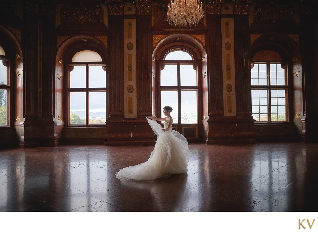 Bride twirling her veil