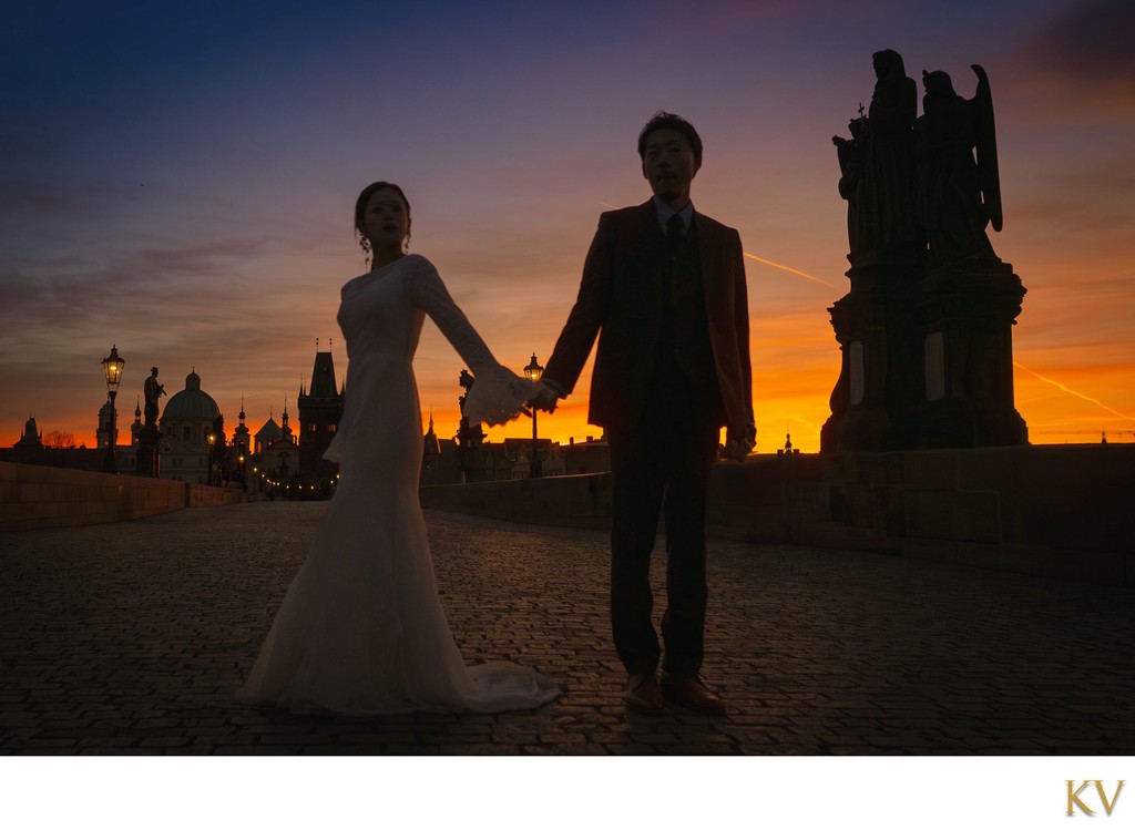 Charles Bridge romance at sunrise