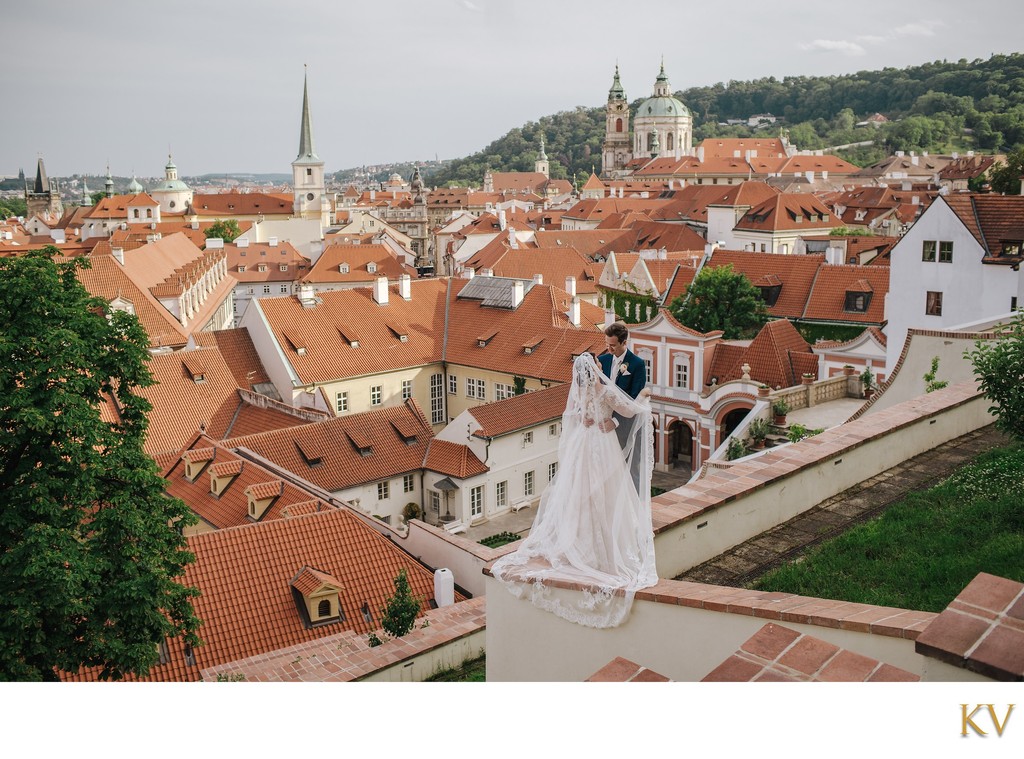 Newlyweds Embrace High Above The Ledebour Garden in Prague