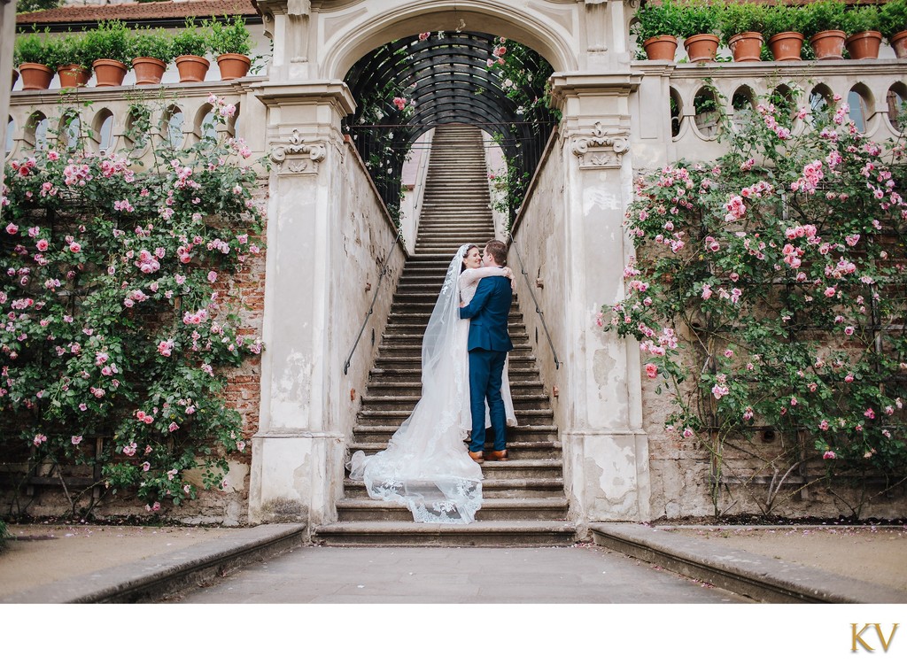 Newlyweds Embrace - Ledebour Garden Luxury Weddings Prague