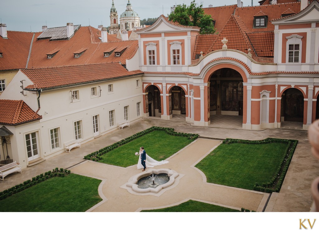 Prague newlyweds walking through Ledebour Garden