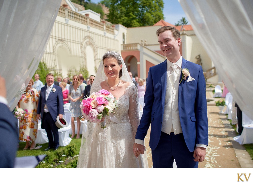 Smiling Bride And Her Groom At The Ledebour Garden