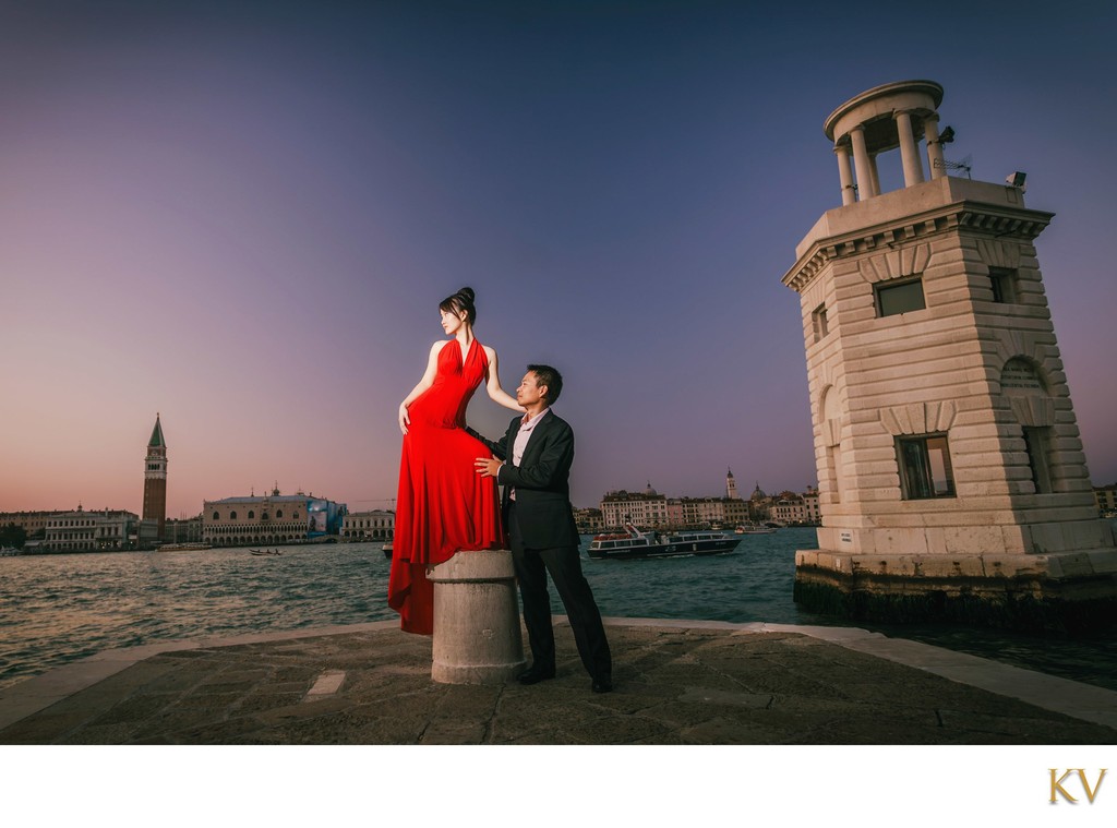 Thai Woman In red dress posing for her man in Venice