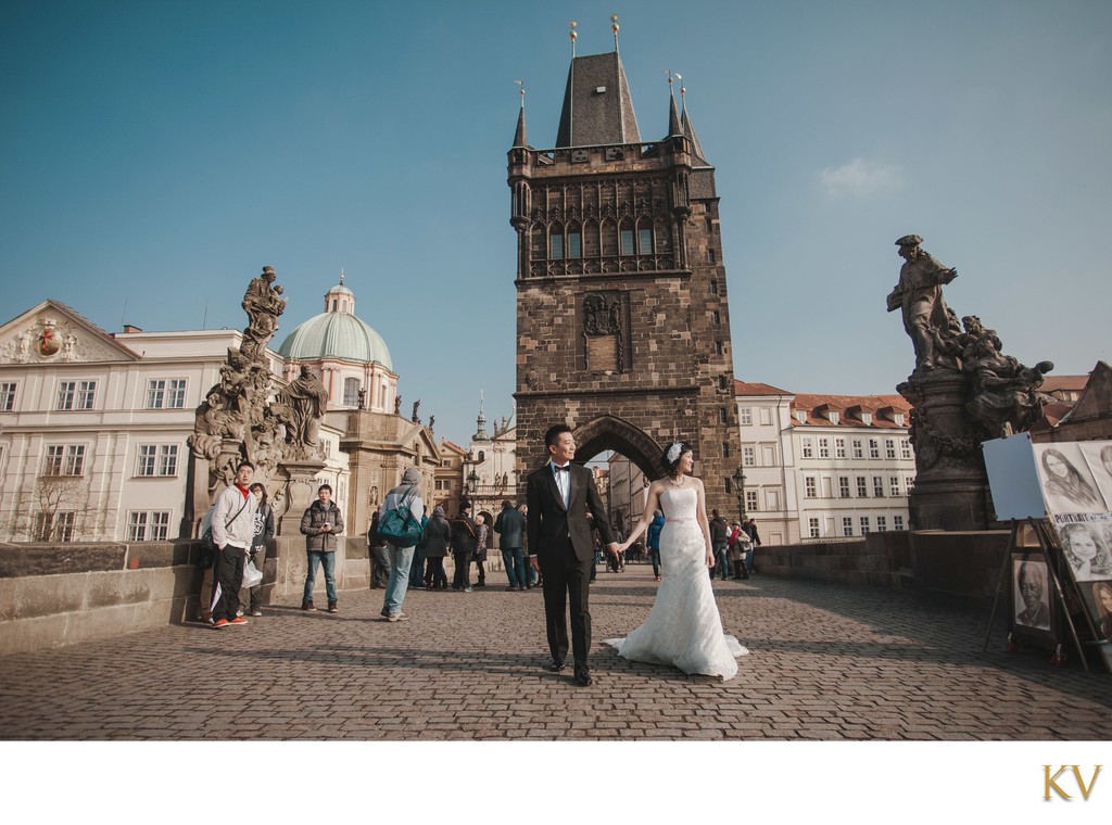 Hong Kong newlyweds exploring Charles Bridge