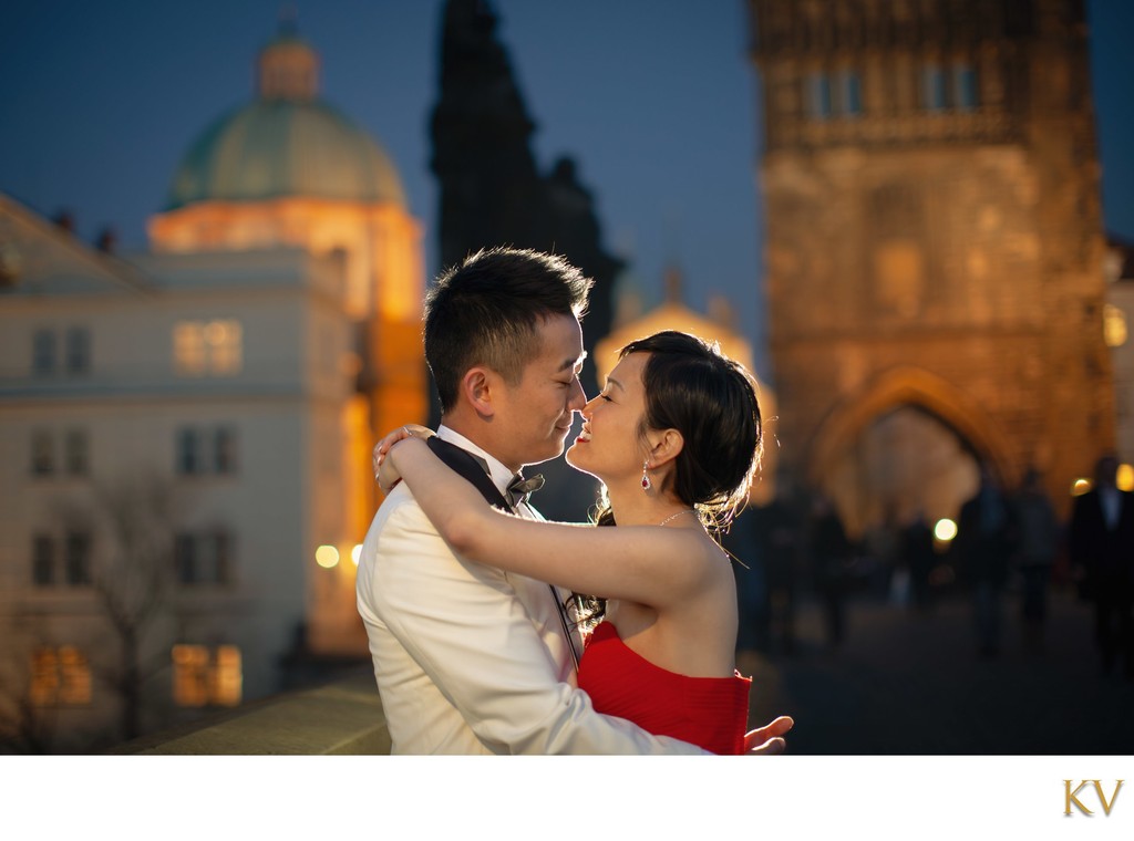 Gorgeous Hong Kong couple enjoying romantic Charles Bridge