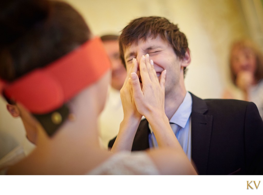 blindfolded bride struggles to find groom