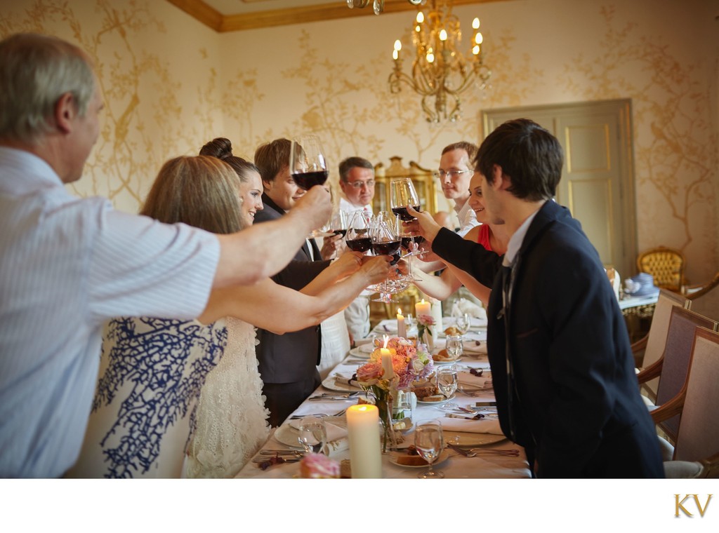 toasting the newlyweds with wine