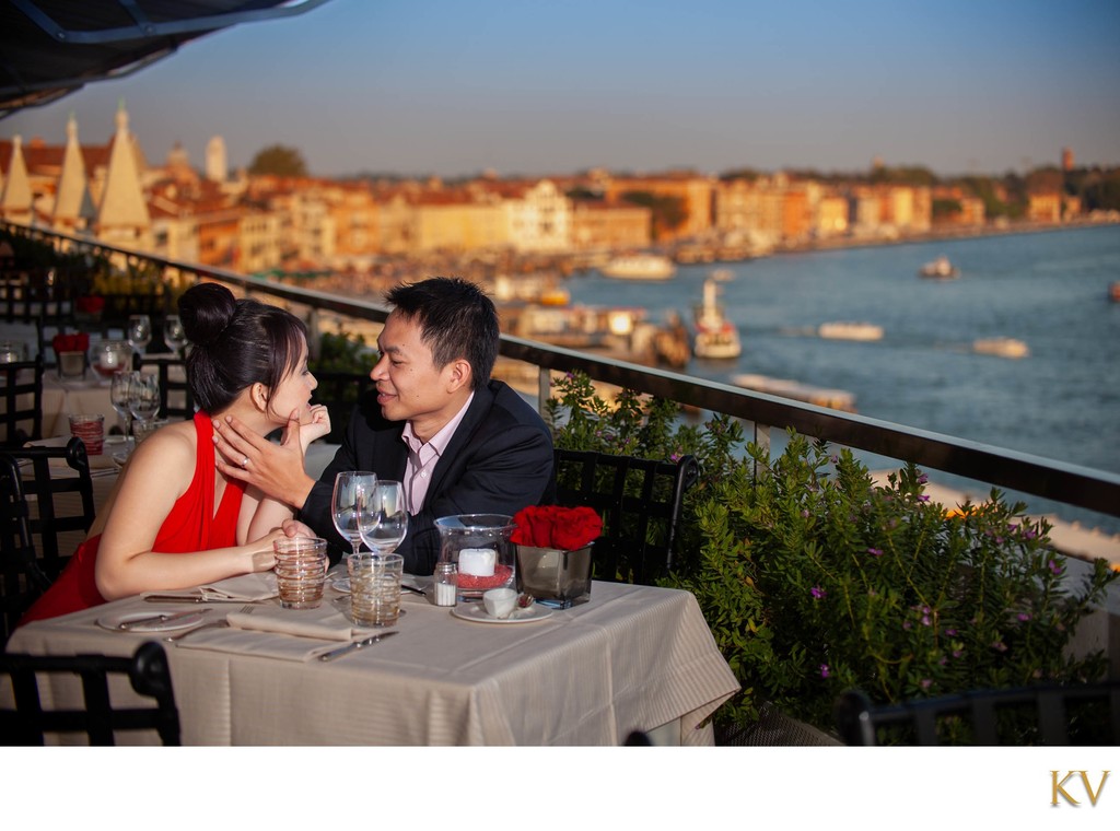 Caress for his lady at the rooftop terrace at the Hotel Danieli