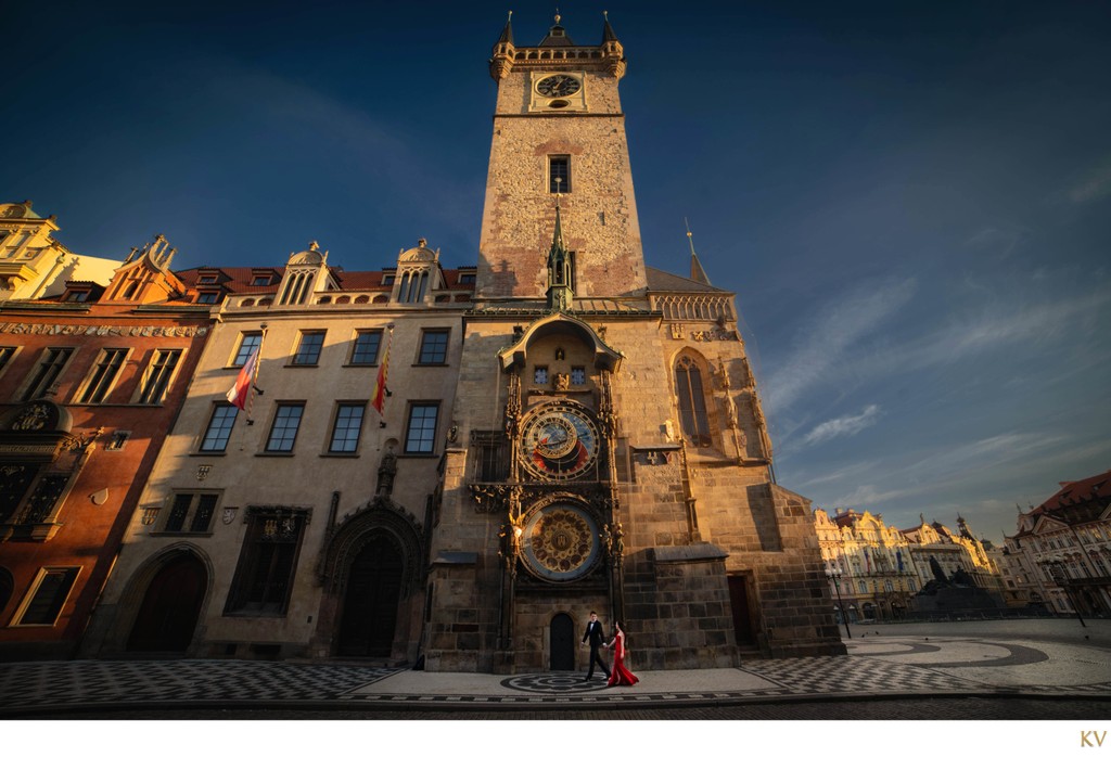 Elegant Couple Walking Under Orloj