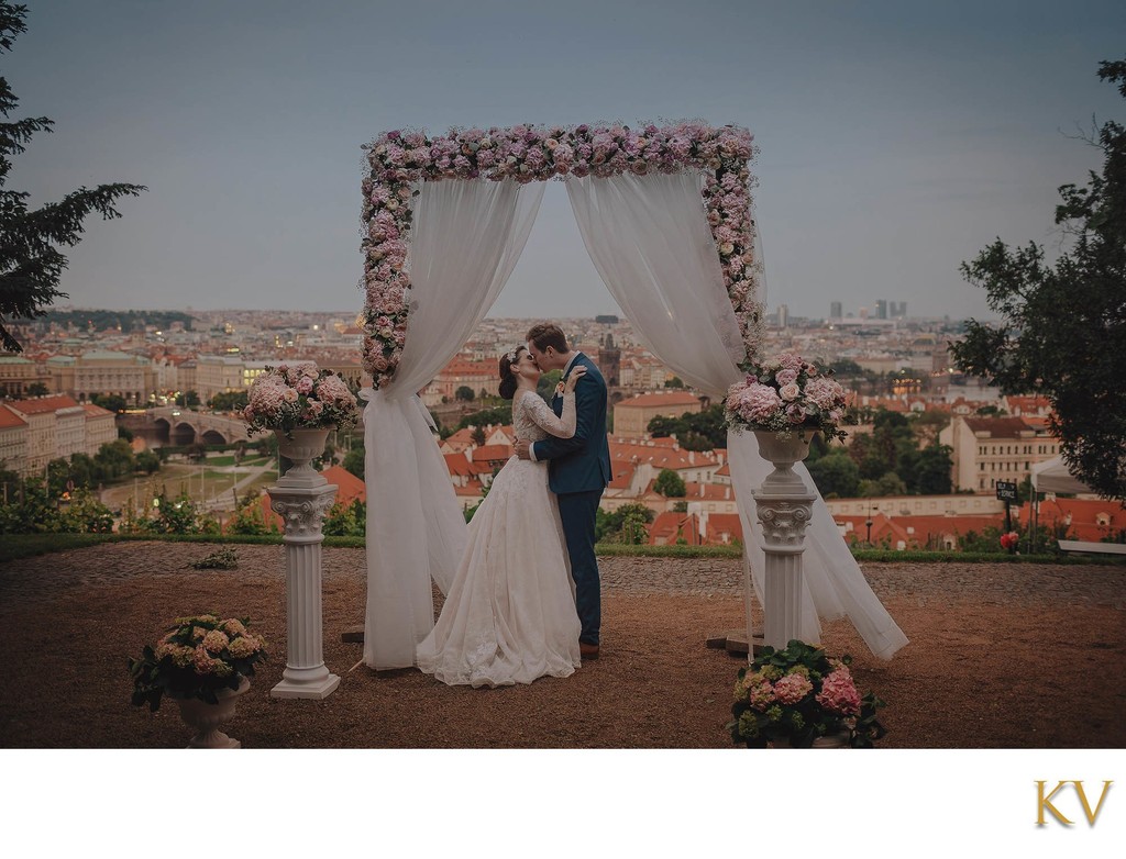 Newlyweds Share Romantic Kiss Twilight Above Prague