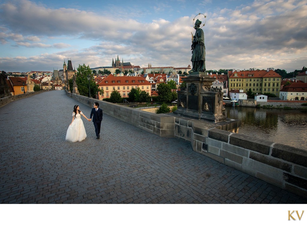 Korean Newlyweds Walking Across Empty Charles Bridge