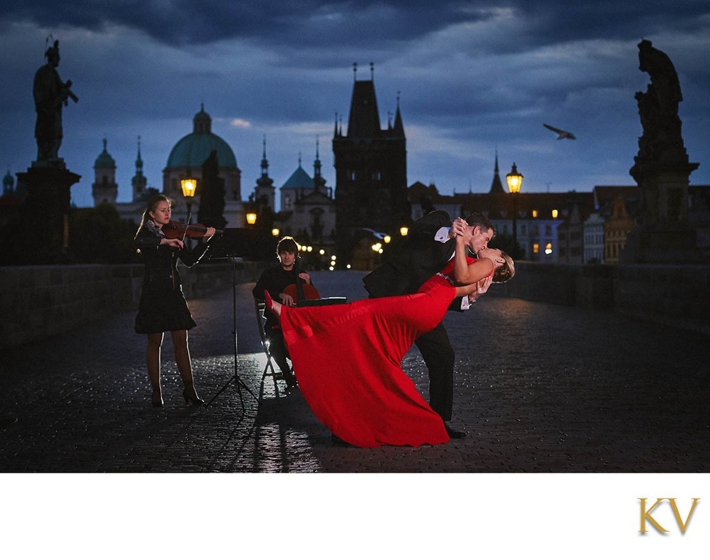 Prague Charles Bridge Night Proposal Photo - Red Dress Kiss