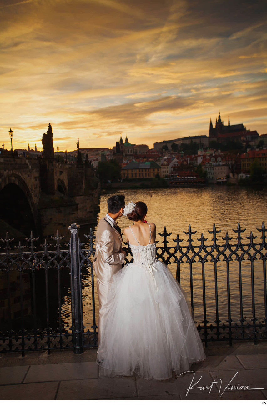 Singapore Couple - watching sunset over Prague Castle