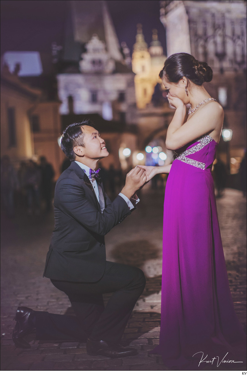 Ray proposes to Enzo atop the Charles Bridge in Prague