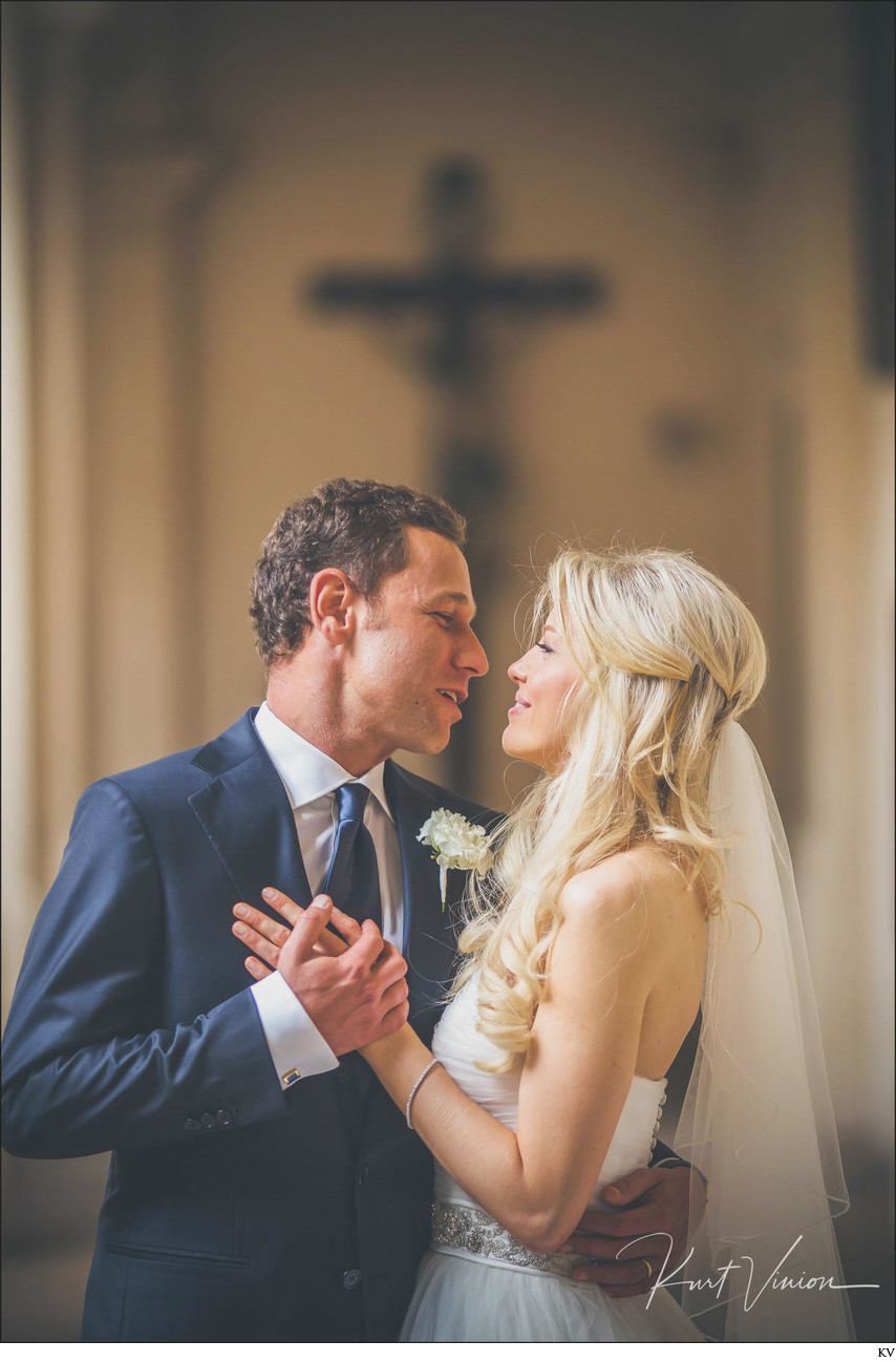 The groom serenades his bride at church