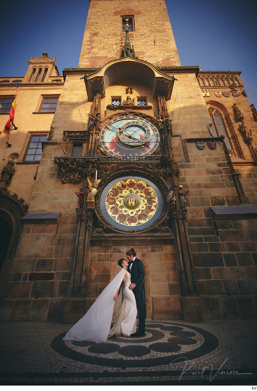 Bride in Berta dress underneath Astronomical Clock