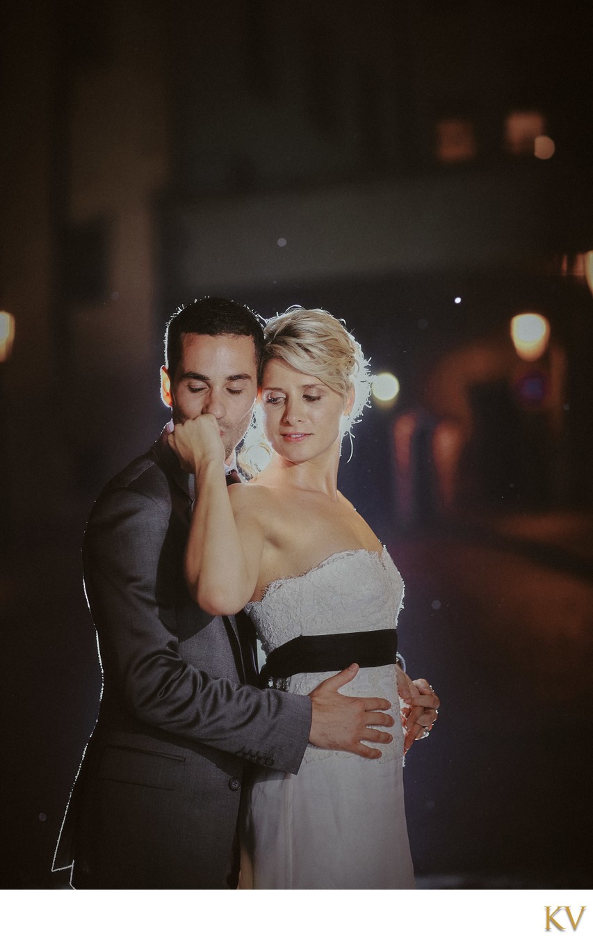 Kissing his bride's hands 