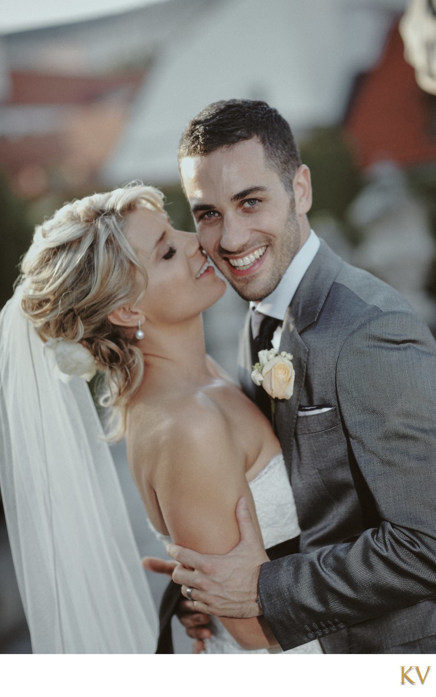 New Zealand bride kisses her groom