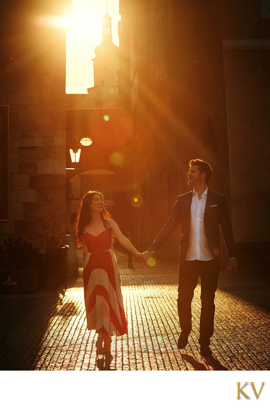 gorgeous Italians walking in sunlight in the old town