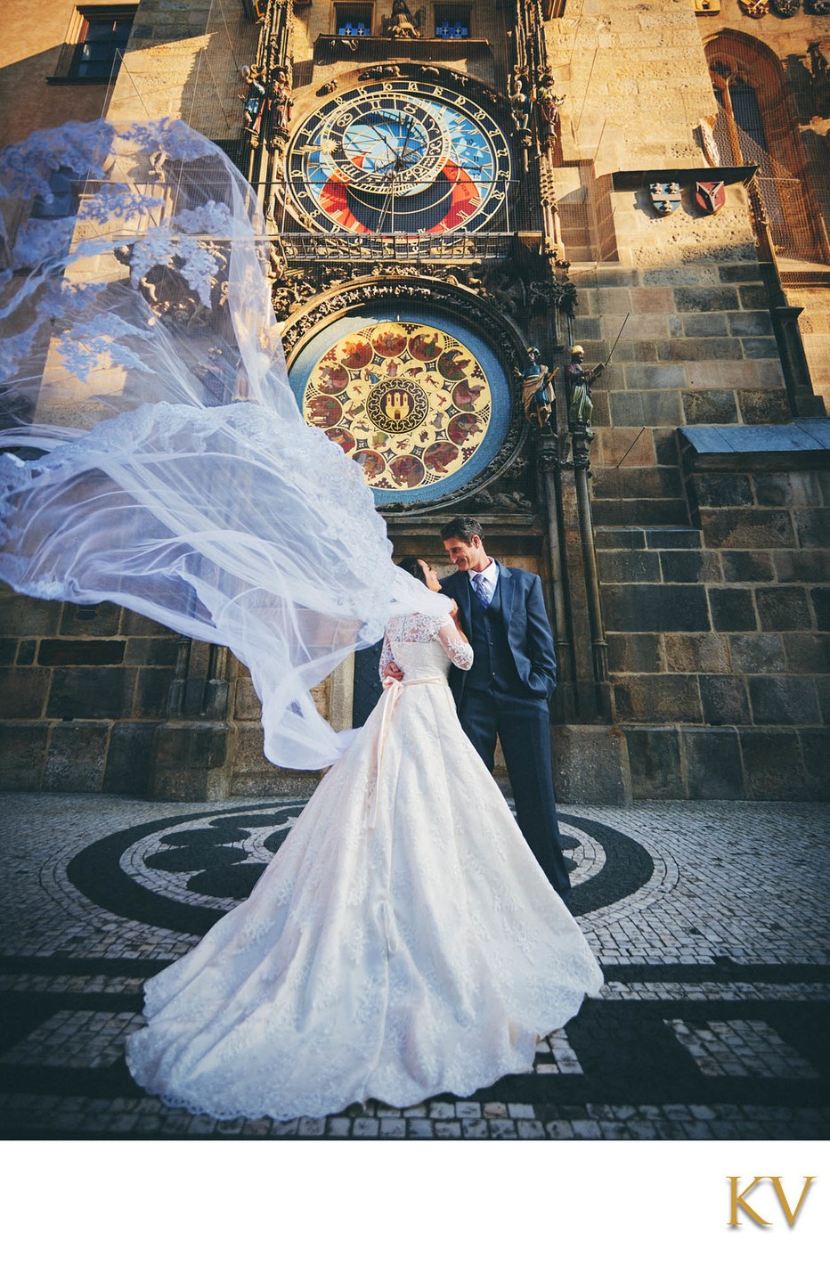 bride & groom underneath the Astronomical Clock