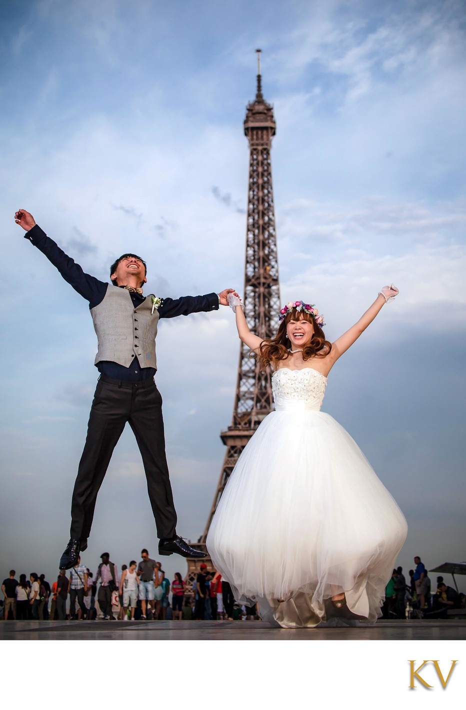 Newlyweds doing it their way at Eiffel Tower