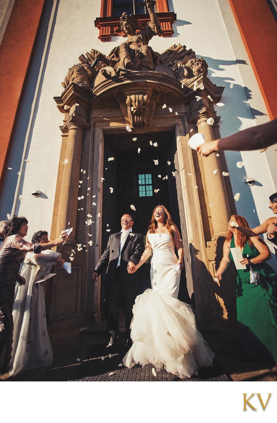 newlyweds exit - Troja Chateau weddings