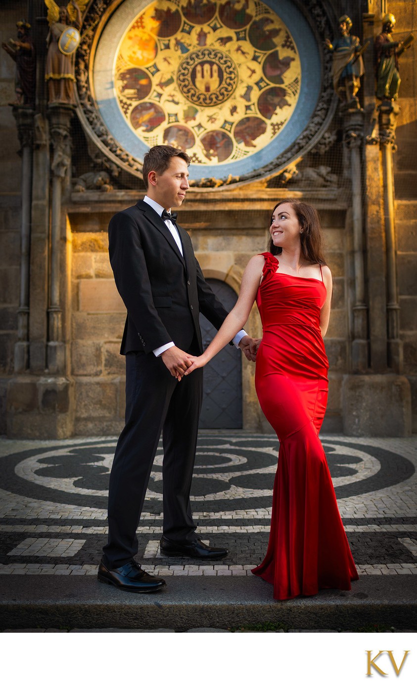 elegant woman in red under Orloj