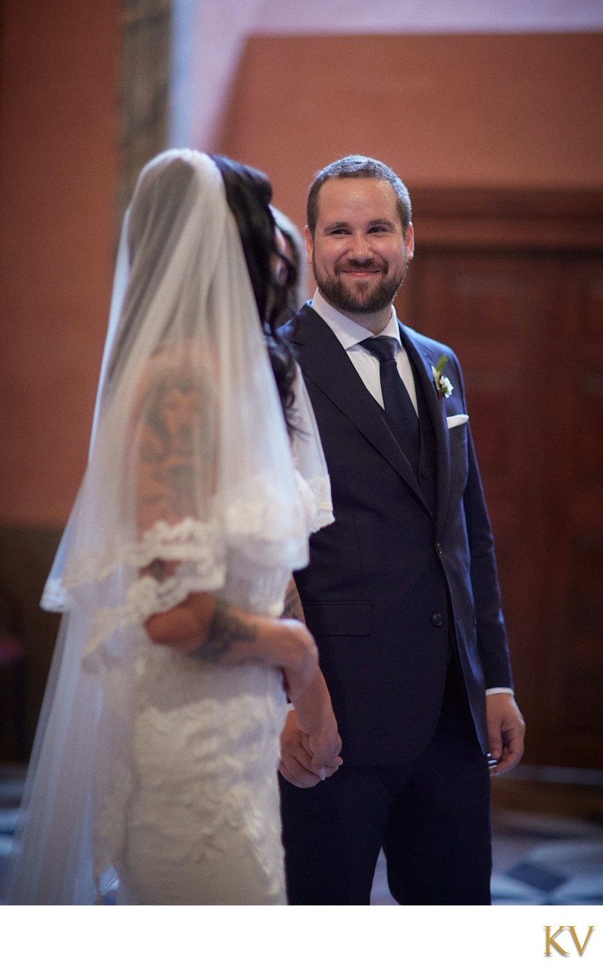 smiling groom ceremony