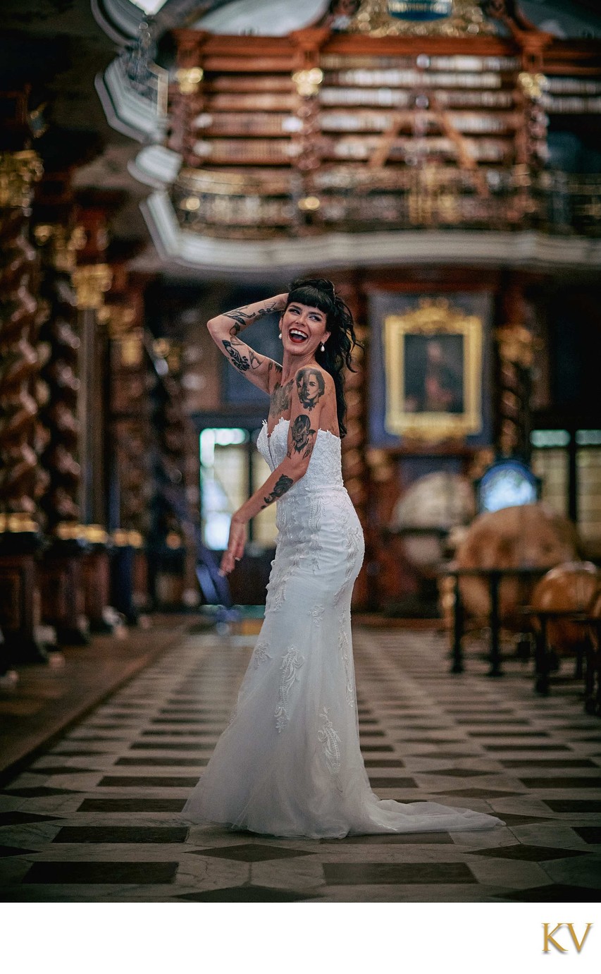 sexy tattooed bride laughing in Library