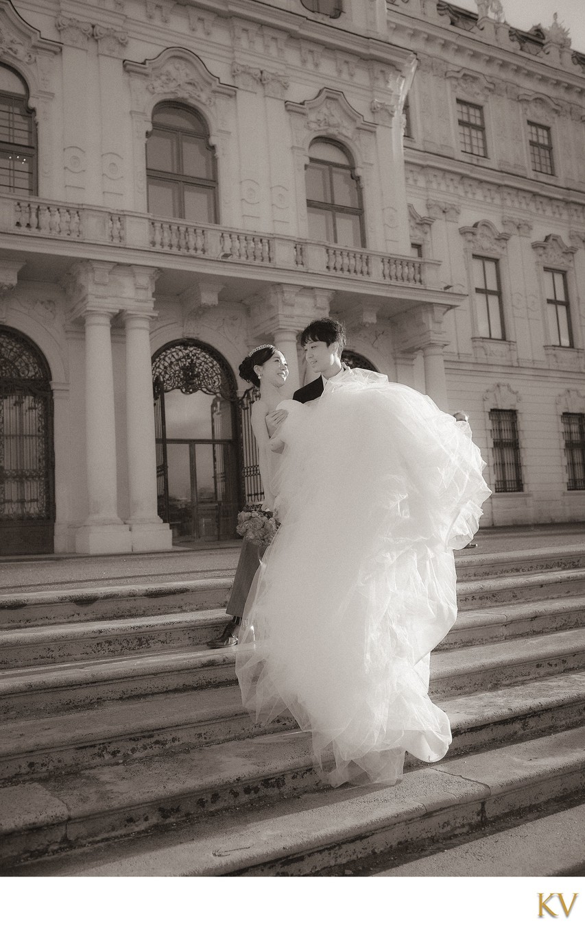 Picking up his bride in front of Belvedere