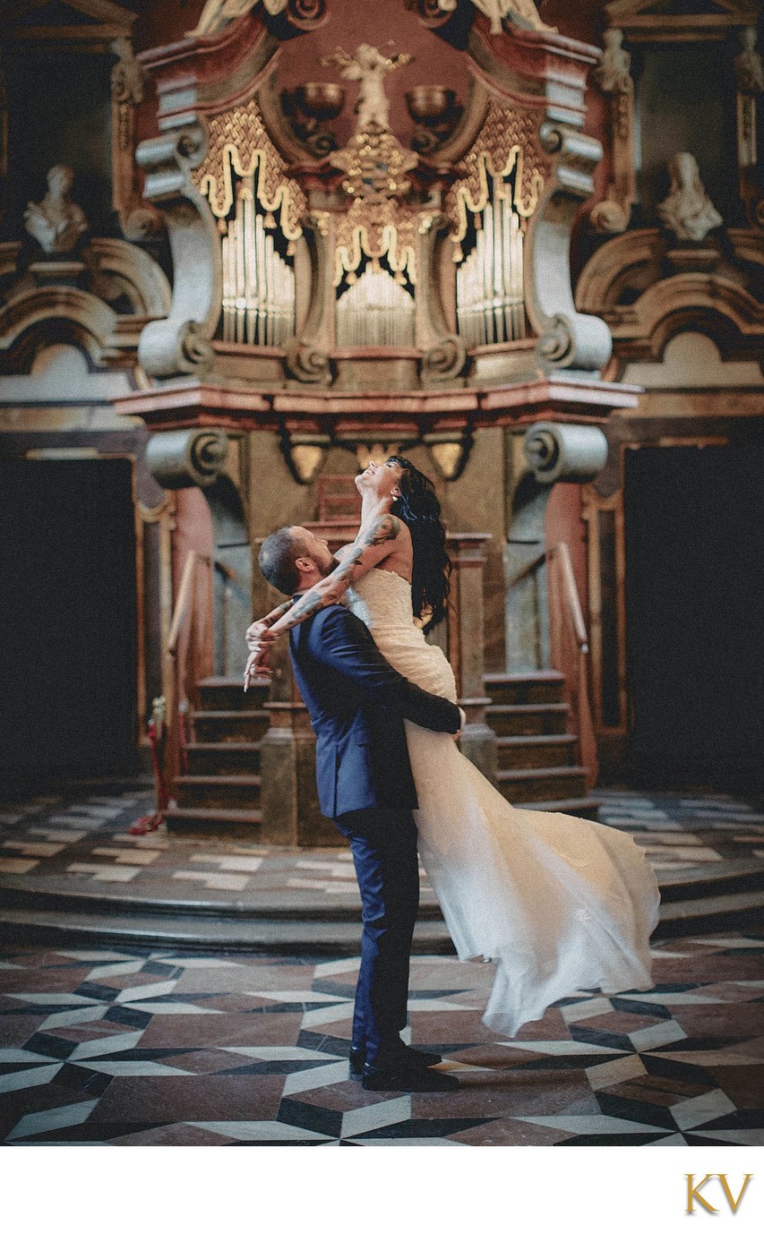 spinning his bride near the alter