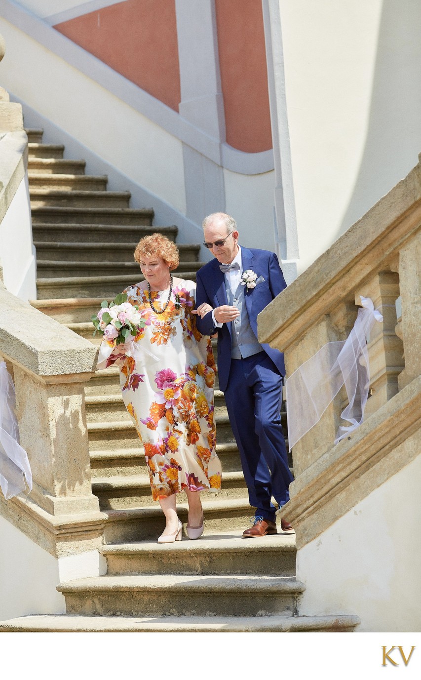 The groom's father escorts the bride's mother to the Ledebour Garden