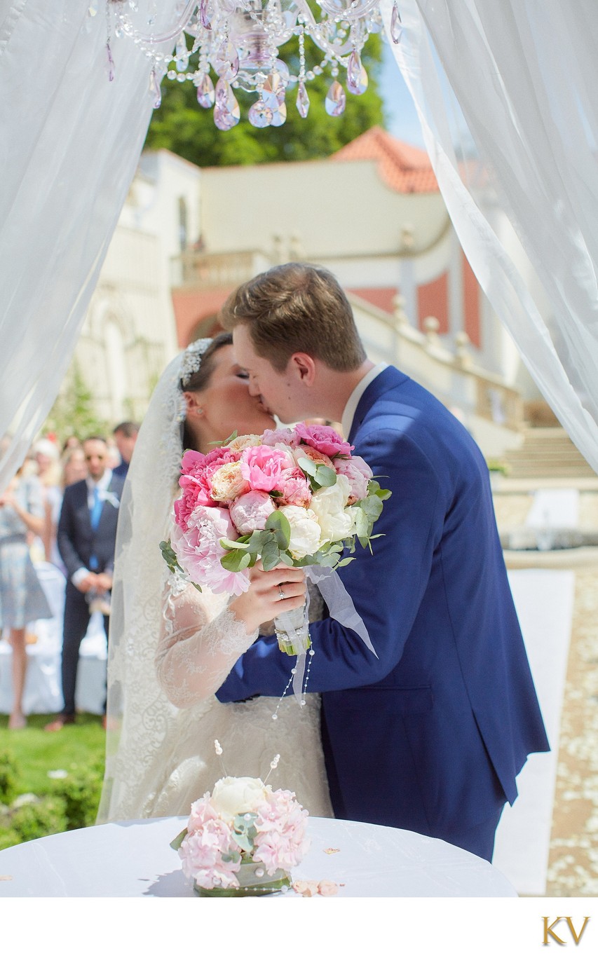 Newlyweds Kiss as Husband and Wife at the Ledebour Garden 