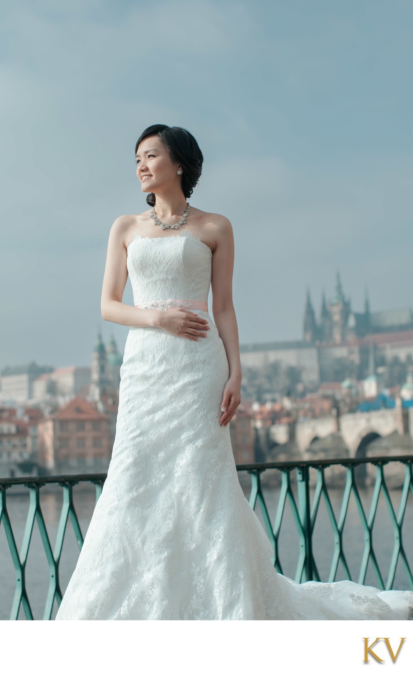 Elegant Hong Kong Bride posing near Prague Riverside