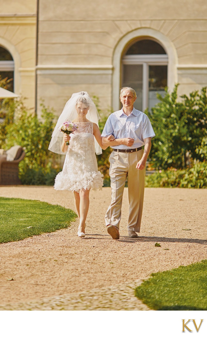 Proud Father Escorts Bride