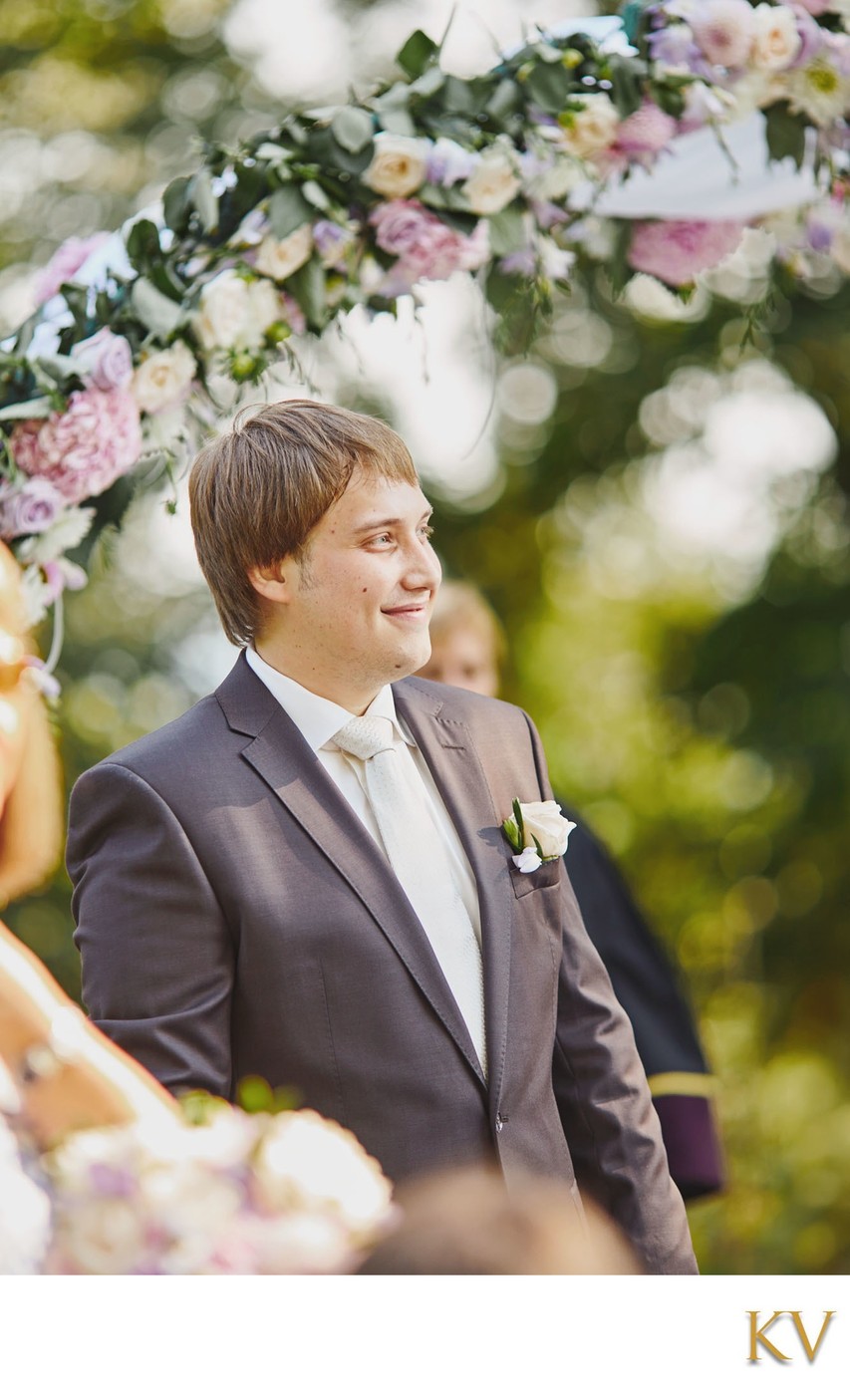 Smiling Groom Sees Bride