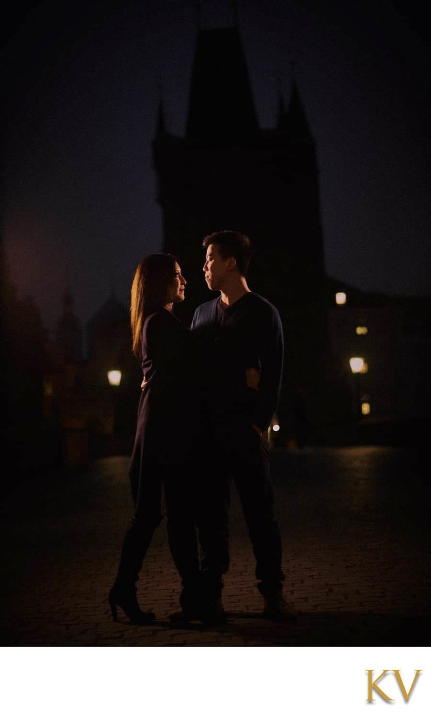 couple-silhouetted-gothic-tower