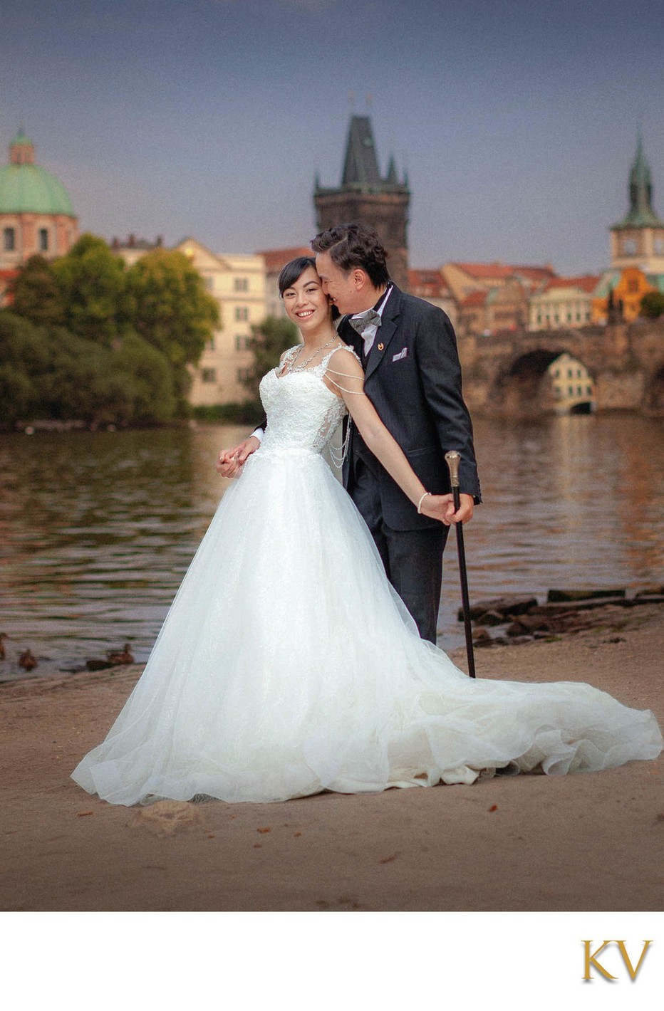 Iconic Riverside and Charles Bridge Couples Photo