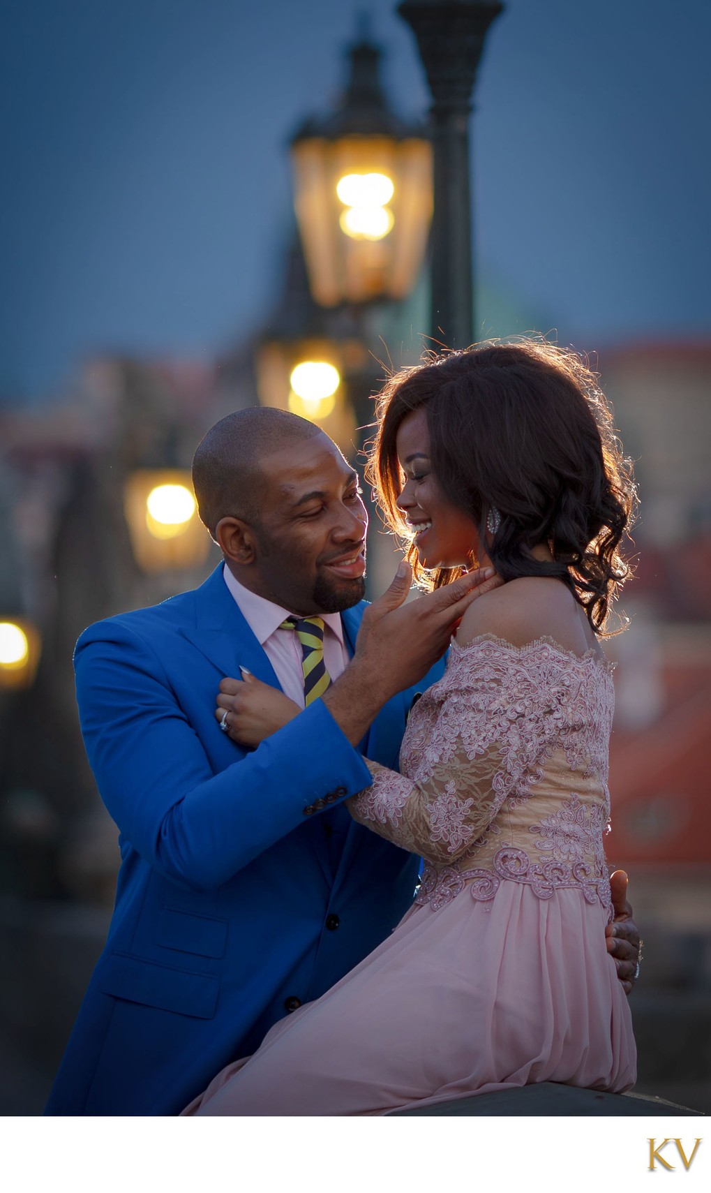 Sexy Stylish Nigerian couple enjoying Charles Bridge at night