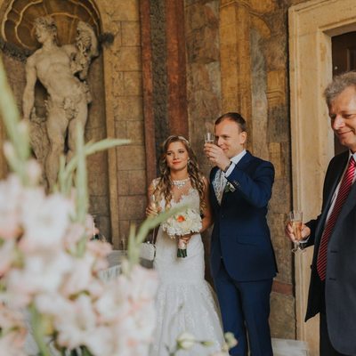 Champagne toast for the newlyweds at the Vrtba Garden