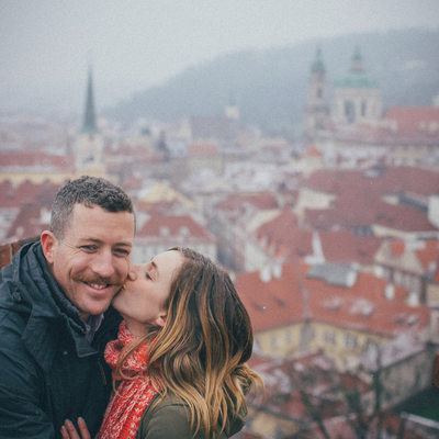 A kiss for the newly engaged high above Mala Strana