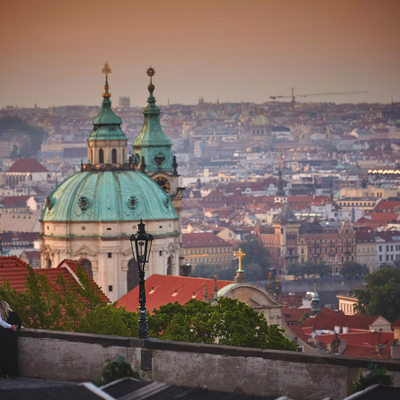 snuggling & looking over St. Nicholas Church in Prague