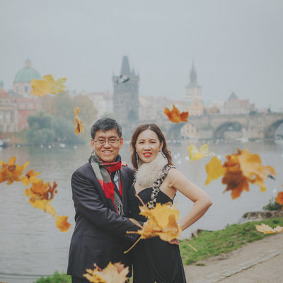 Mother & father with Autumn leaves Prague