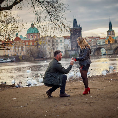 on his knee with the ring - Prague marriage proposal
