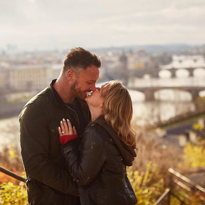 the happy newly engaged overlooking Prague